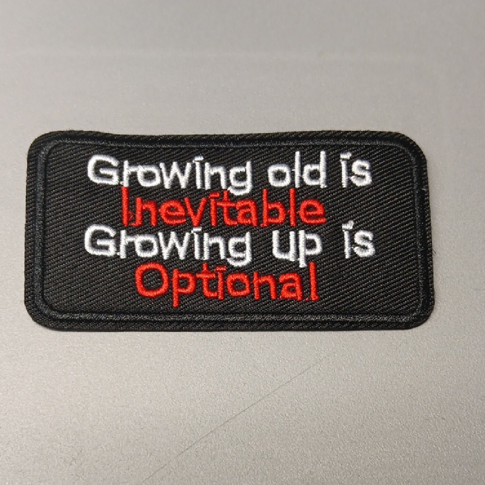 Black Patch with White and Red Text